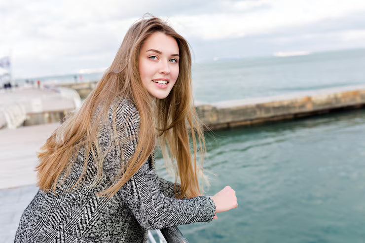 files/happy-smiling-long-haired-woman-with-big-blue-eyes-red-shirt-grey-coat-walks-near-sea_291650-343_jpg.avif